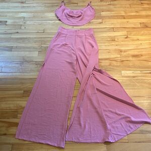 Glamaker pink 2-piece “jumpsuit”. Wide leg high split pants. Draped ruffle top.